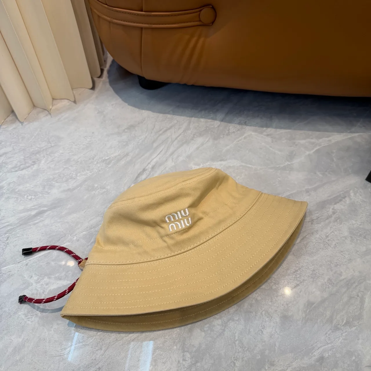 Miu Miu Bucket Hat in Beige · view 6