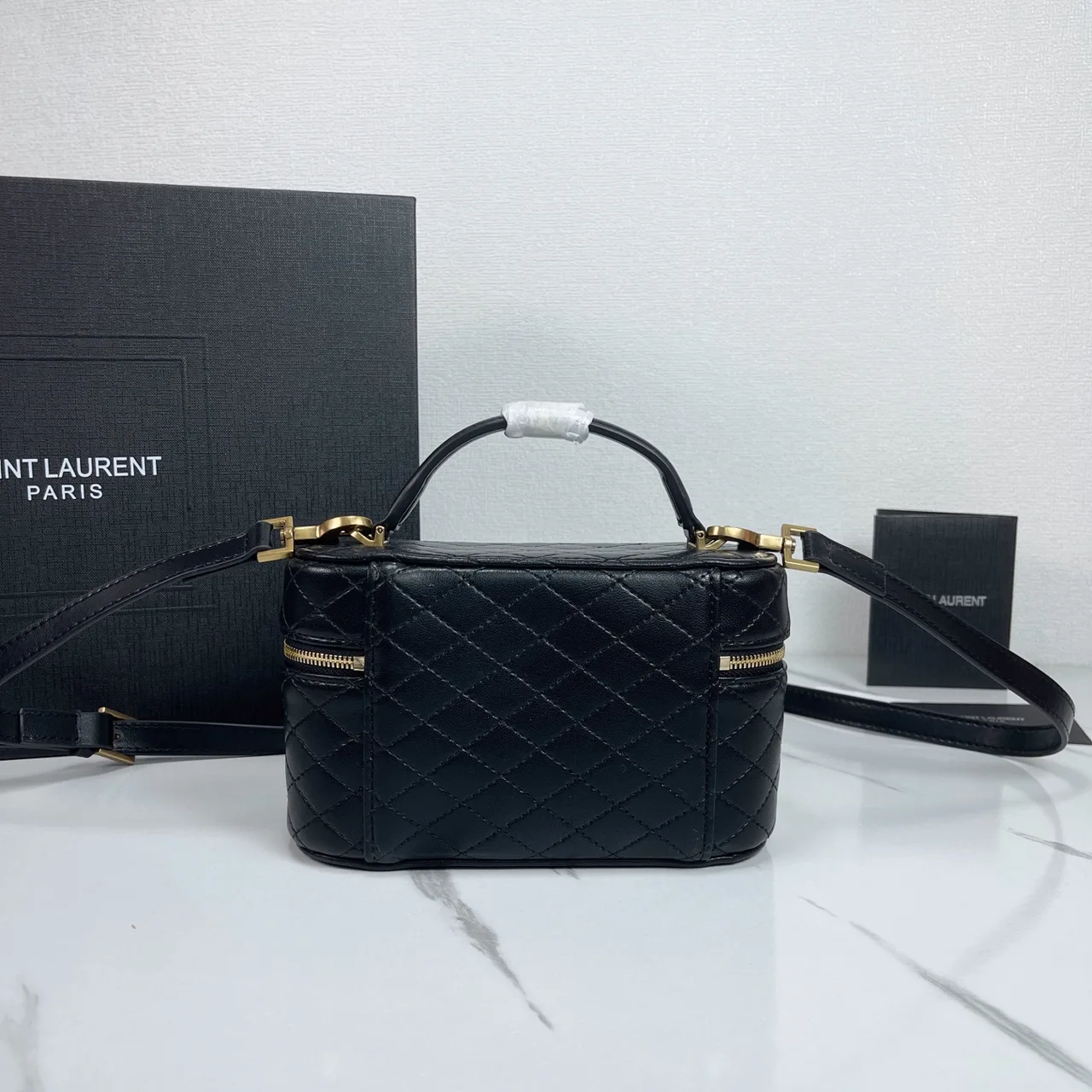 Saint Laurent Quilted Clutch in Black · view 3