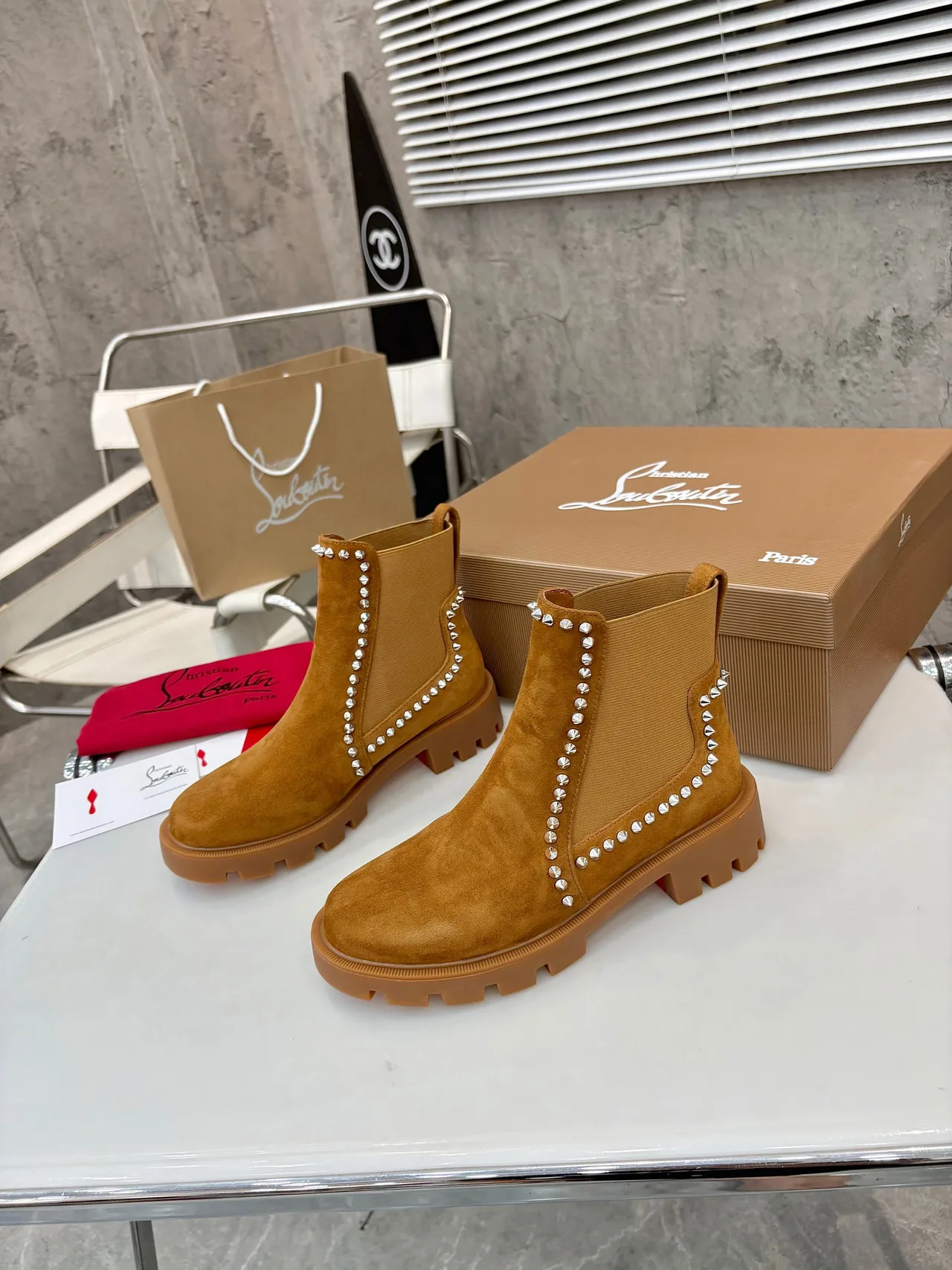 Christian Louboutin Stud-trim ankle boots in Black & Tan · view 5