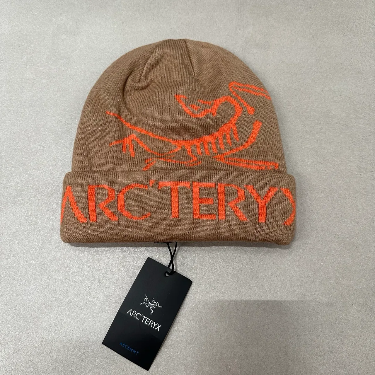 Arc'teryx Graphic knit beanie in Cream & Grey & Burgundy & Orange & Green & Pink & Yellow & Black & Blue & Beige & Tan · view 6
