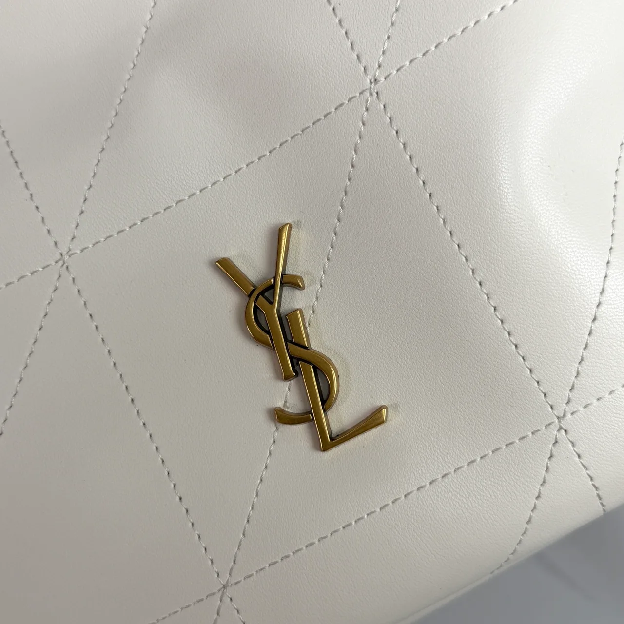 Saint Laurent Quilted Crossbody Bag in White · view 8