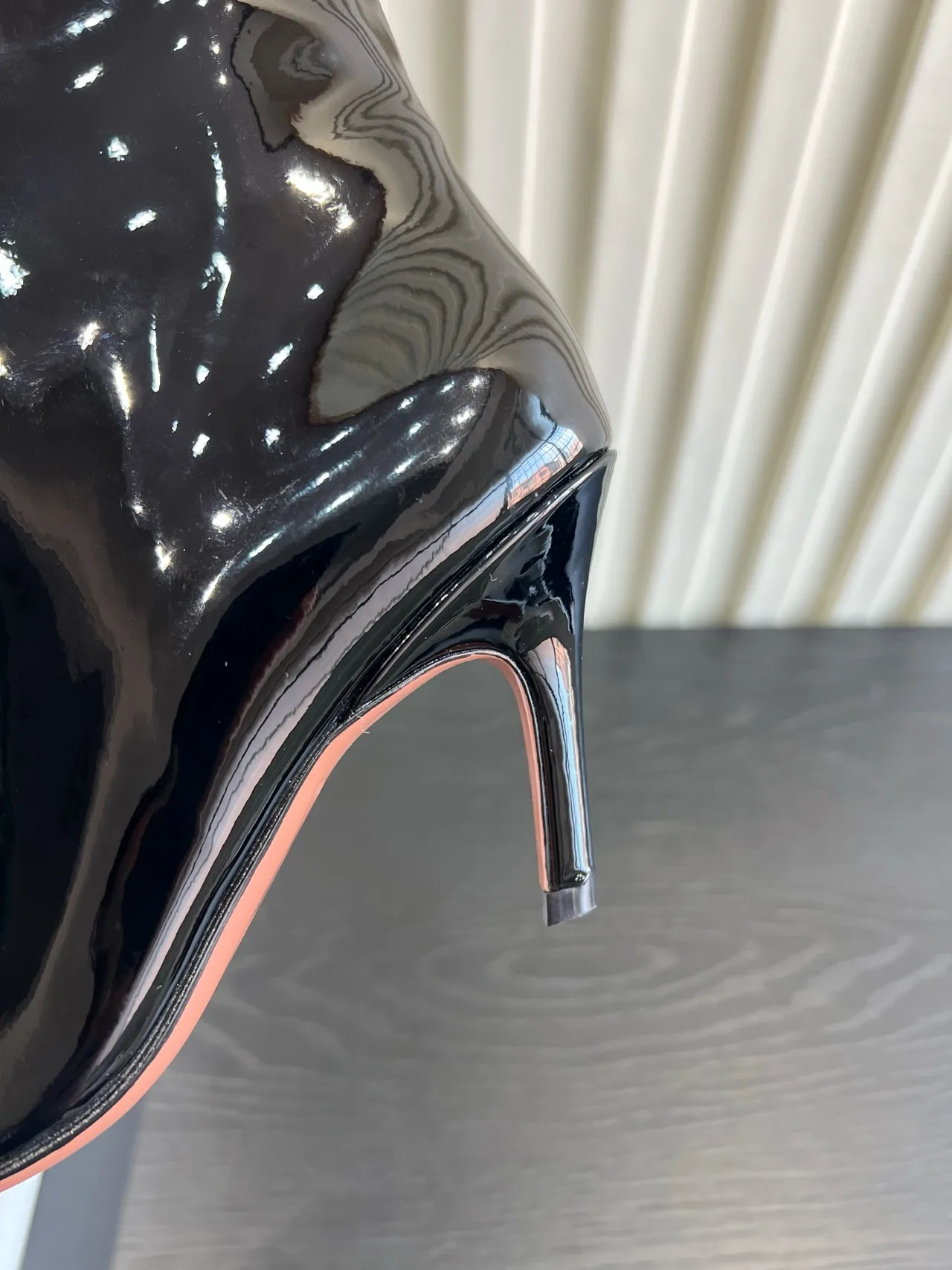 Amina Muaddi Cowhide Glossy Pointed-Toe Knee-High Boots in Black · view 8