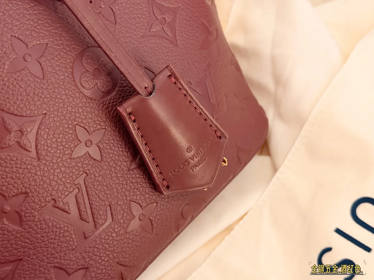 Louis Vuitton Quilted Handbag in Burgundy · view 4
