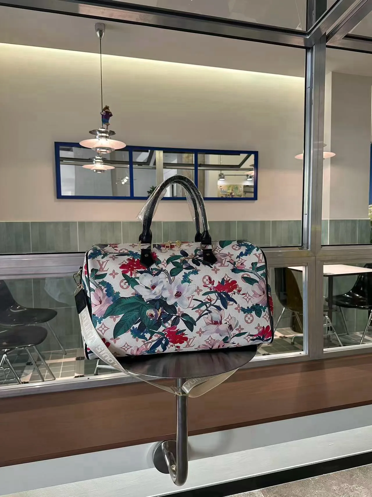 Louis Vuitton Floral Monogram Duffel Bag in White · view 1