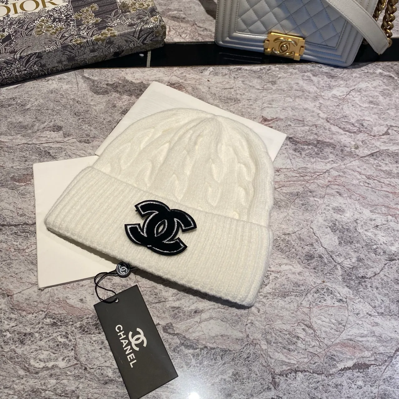 Chanel CC Cable-Knit Beanie in Brown / White / Grey / Pink / Black / Blue / Red · view 6