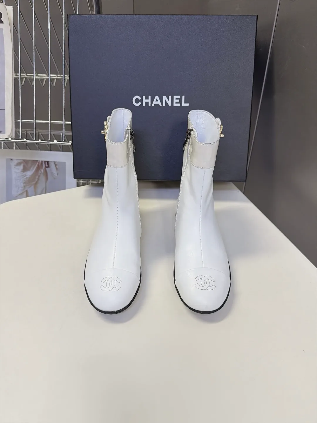 Chanel Calfskin Glossy Pointed-Toe Ankle Boots in White · view 1