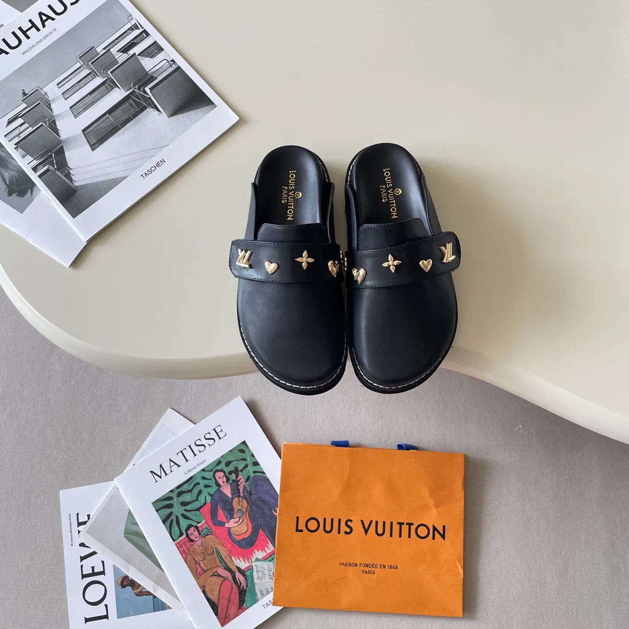 Louis Vuitton Horsebit Mules in Brown / Black / Blue · view 5