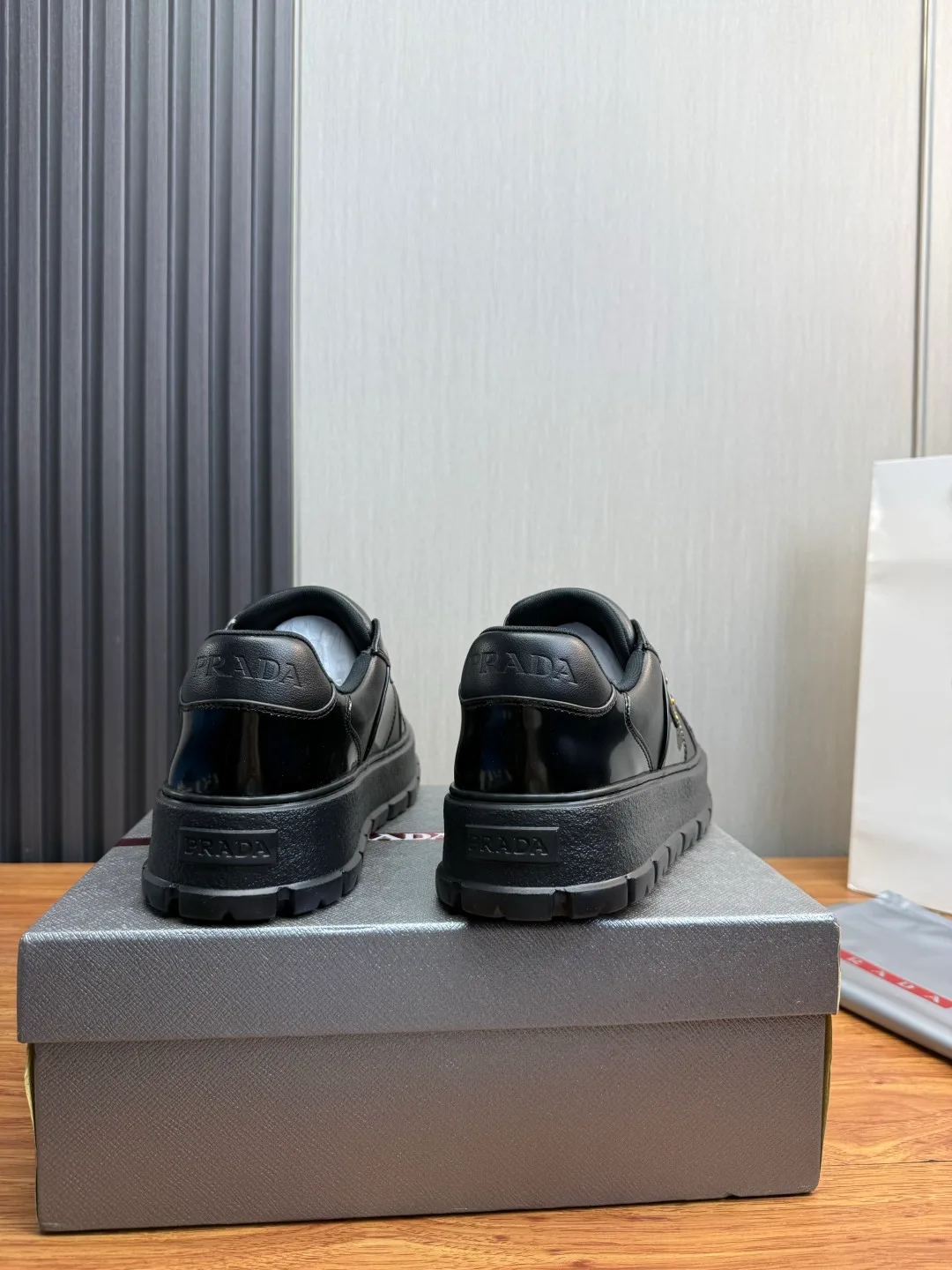 Prada Leather Sneakers in White & Black · view 8