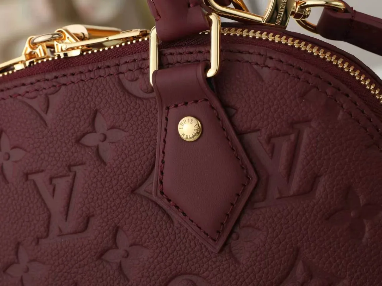 Louis Vuitton Leather Quilted Top-Handle Bag in Burgundy · view 5