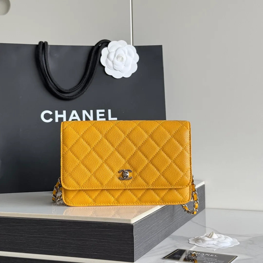 Chanel Calfskin Quilted Clutch in Yellow · view 1
