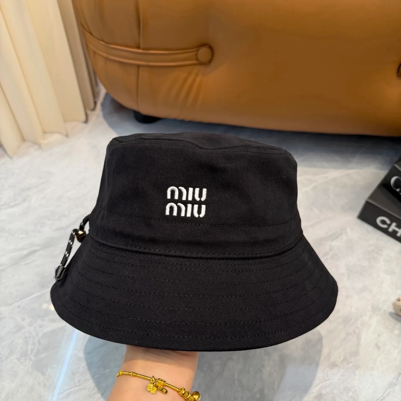Miu Miu Embroidered Bucket Hat in Black · view 1