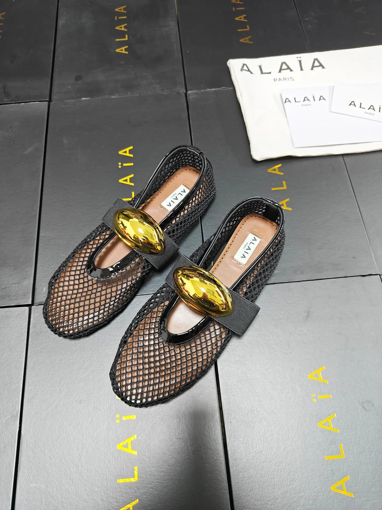Alaia Cowhide Sheepskin Pointed-Toe Mesh Ballet Flats in Black · view 4