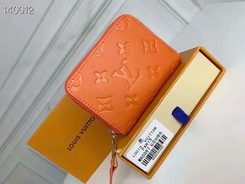 Louis Vuitton Zip Coin Wallet in Orange · view 3