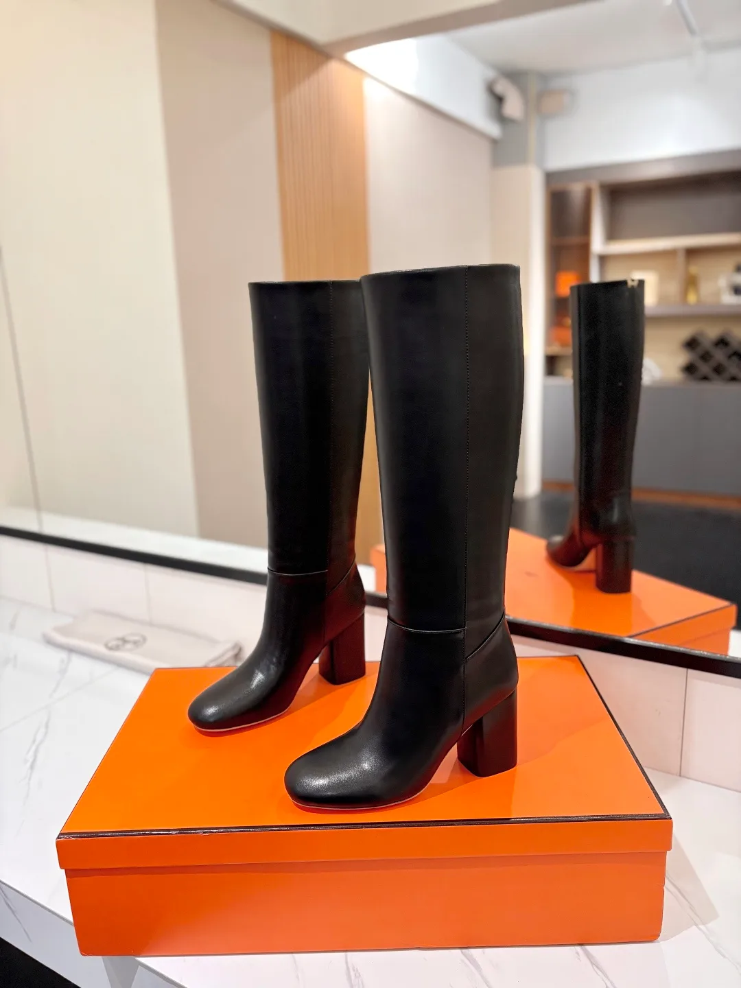 Hermes Cowhide Knee-High Boots in Black · view 2