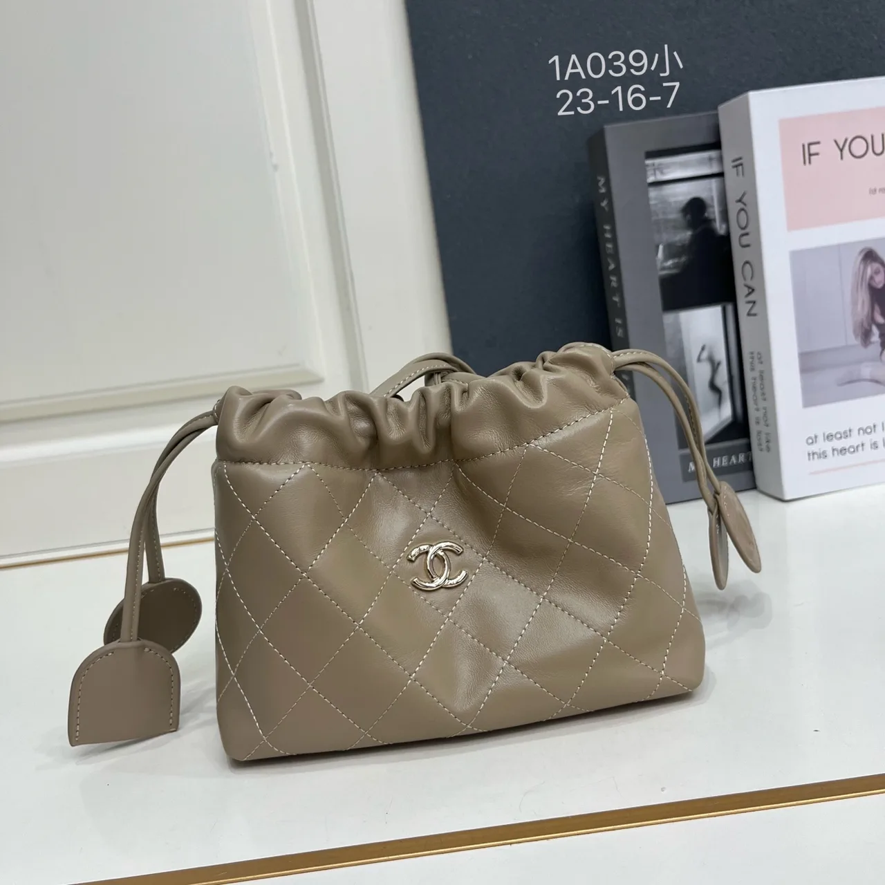 Chanel Quilted Clutch in Beige · view 1