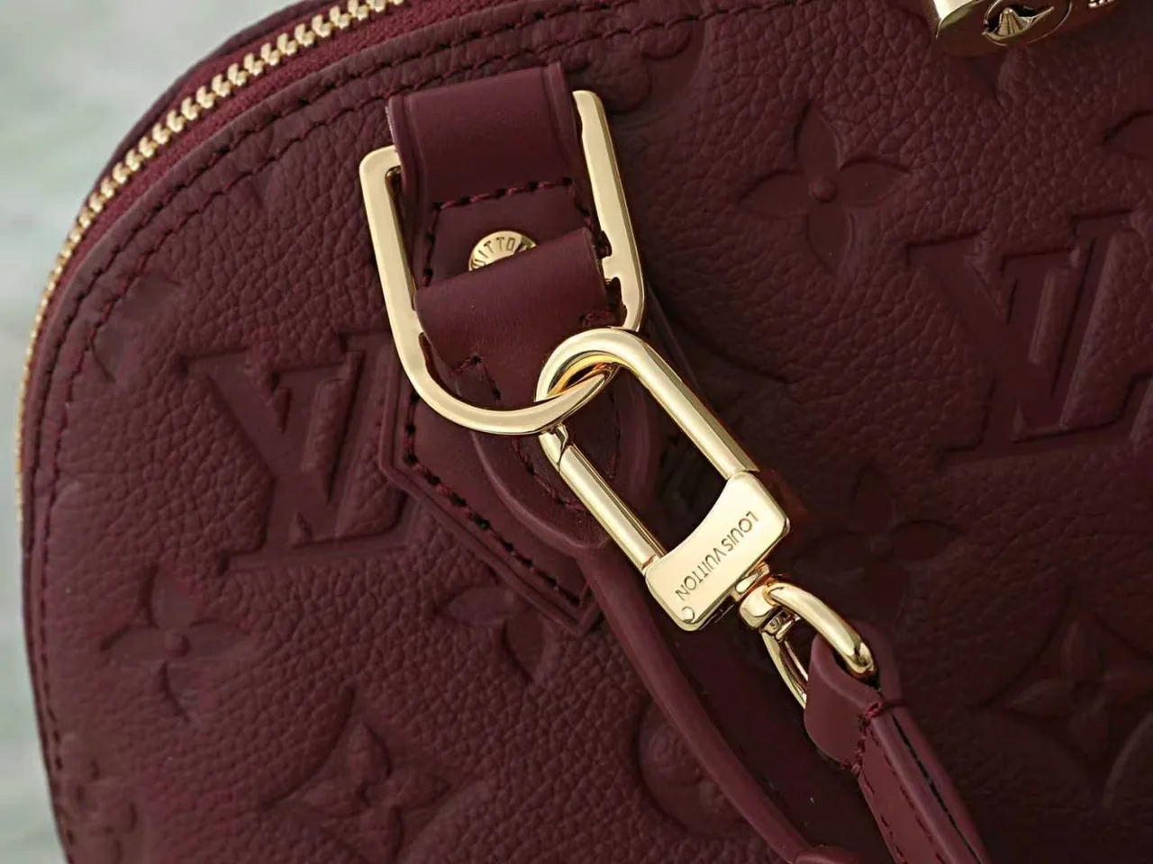 Louis Vuitton Leather Quilted Top-Handle Bag in Burgundy · view 7