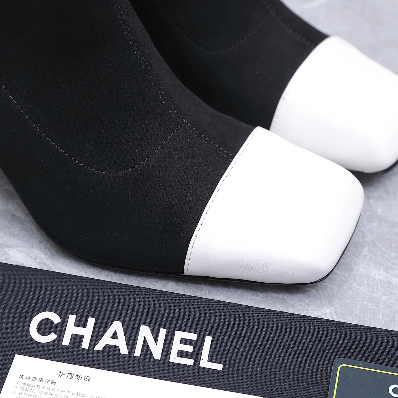 Chanel Cowhide Boots in Black · view 7