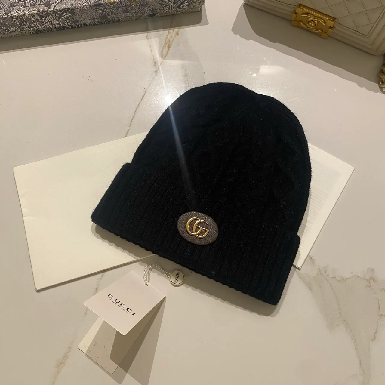 Gucci Cable-Knit Beanie in Black & Grey & White & Cream & Tan · view 1