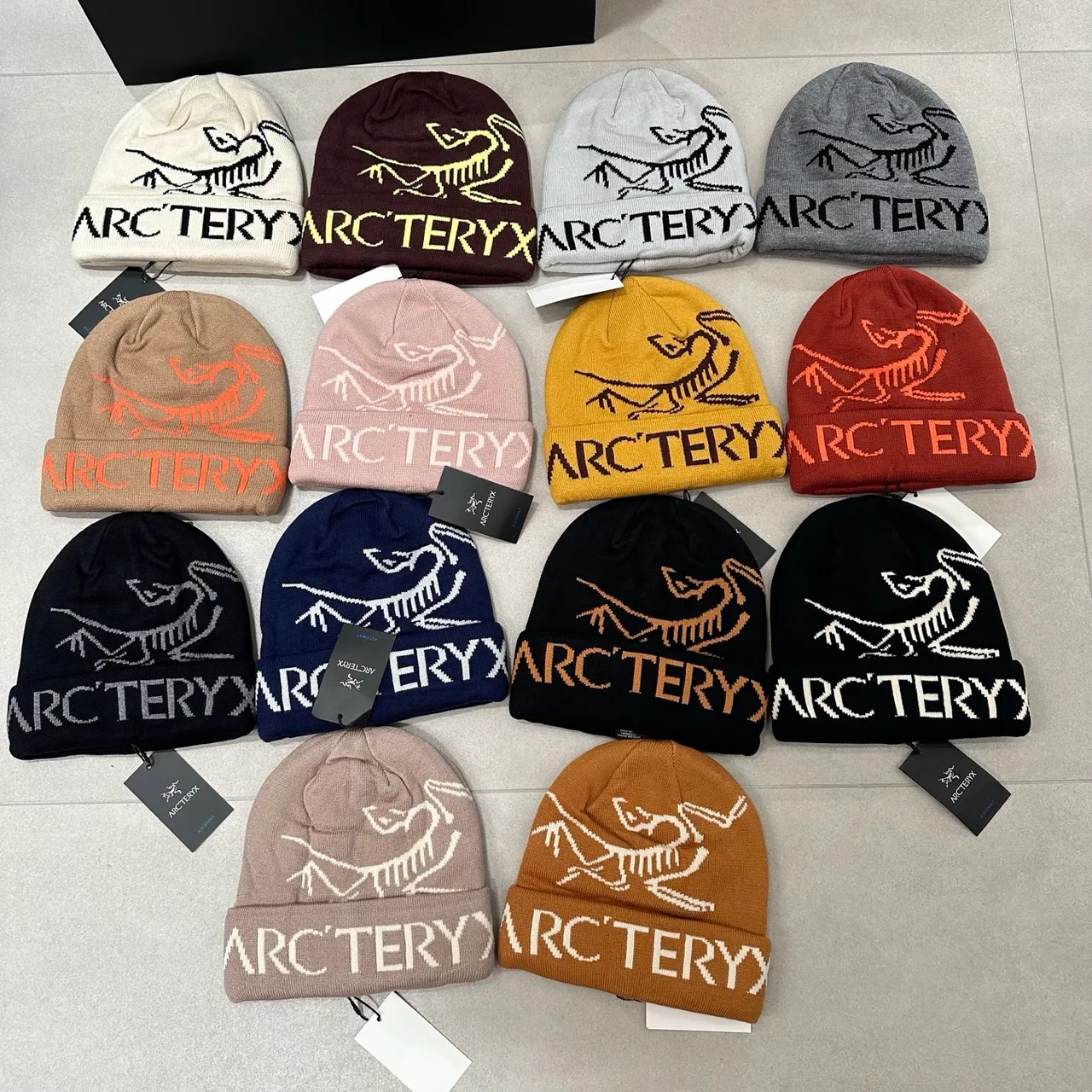 Arc'teryx Graphic knit beanie in Cream & Grey & Burgundy & Orange & Green & Pink & Yellow & Black & Blue & Beige & Tan · view 8