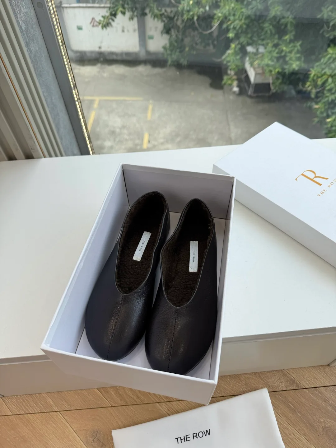 The Row Cowhide Smooth Square-Toe Slip-On Flats in Black · view 1