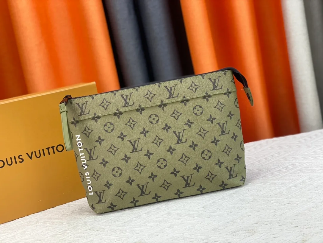 Louis Vuitton Canvas Clutch in Green · view 1