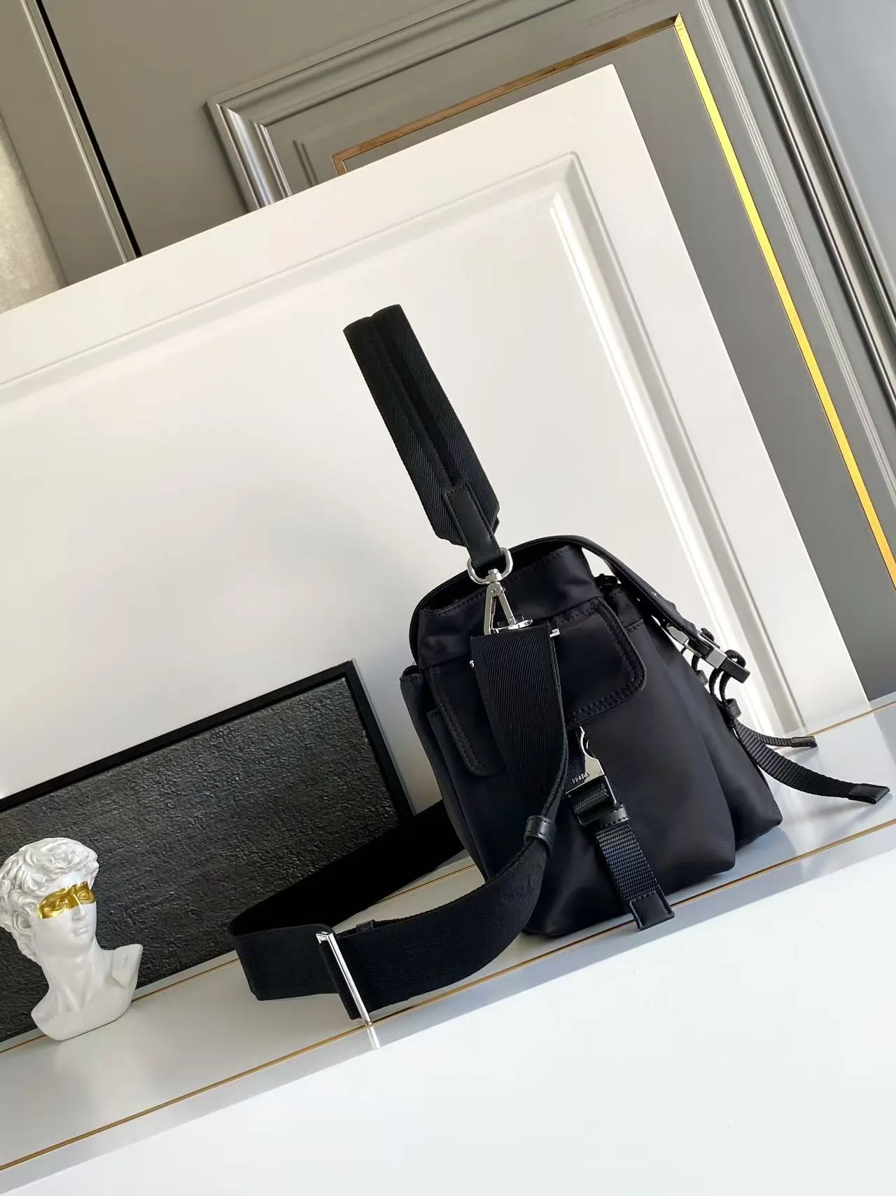 Prada Buckle-Detail Flap Shoulder Bag in Black · view 2
