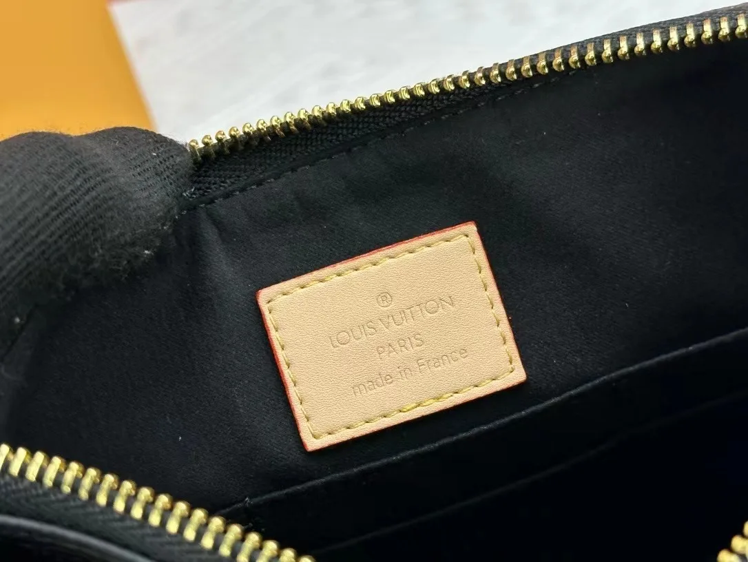Louis Vuitton Calfskin Wristlet Pouch in Brown · view 9