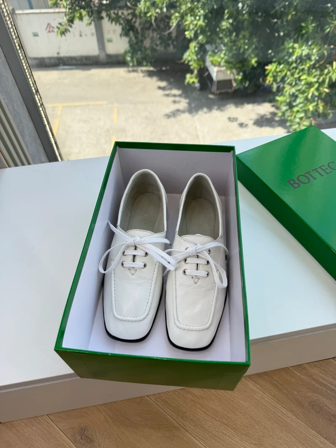 Bottega Veneta Cowhide Boat Shoes in White · view 1