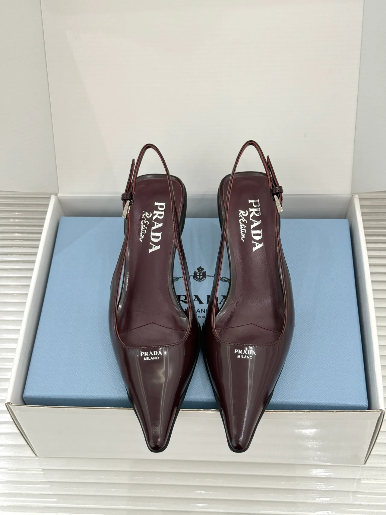 Prada Pointed Slingback Pumps in Burgundy · view 1