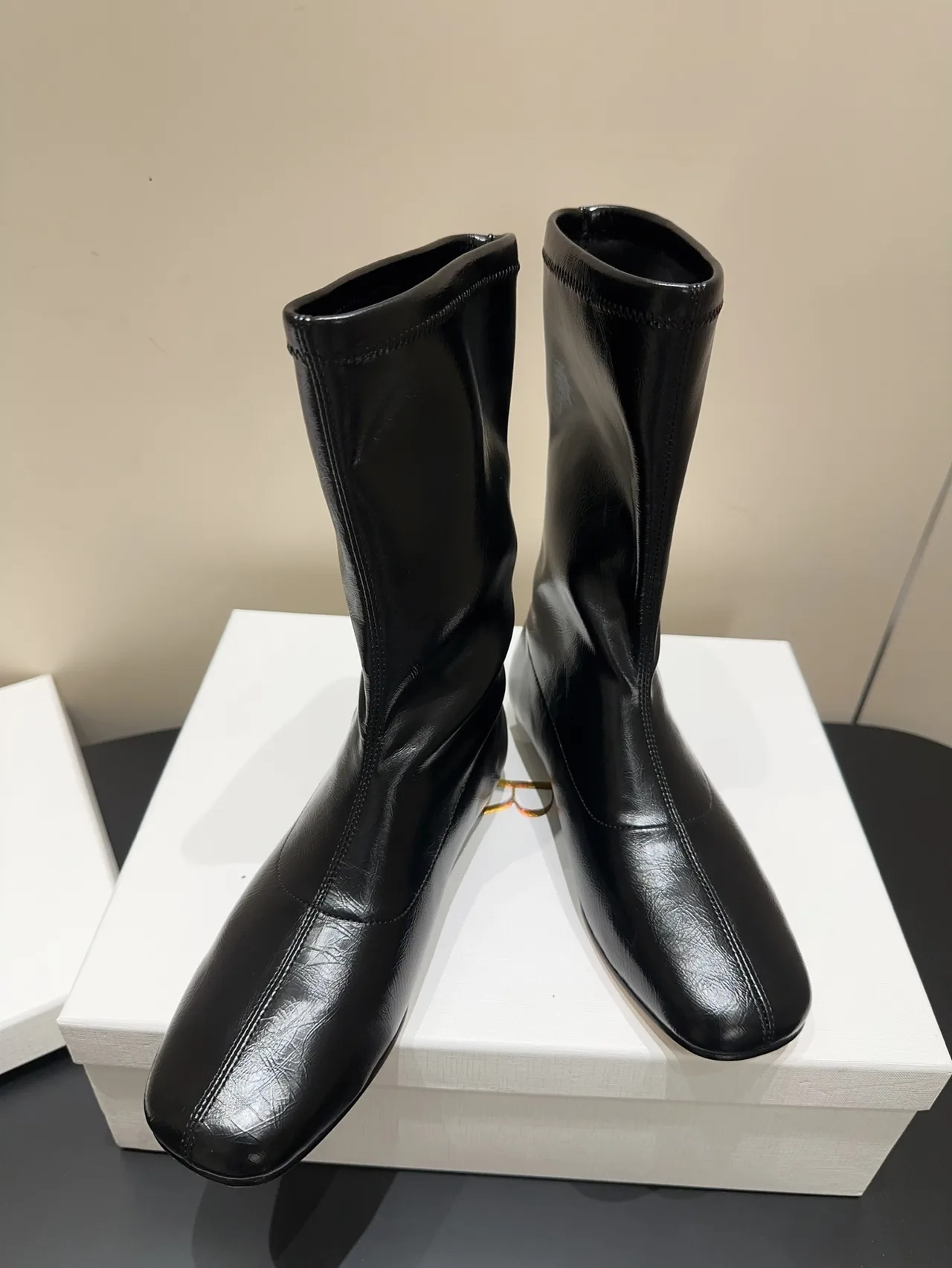 The Row Cowhide Sheepskin Glossy Round-Toe Ankle Boots in Black · view 2