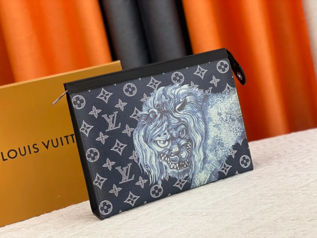 Louis Vuitton Canvas Clutch in Blue · view 3