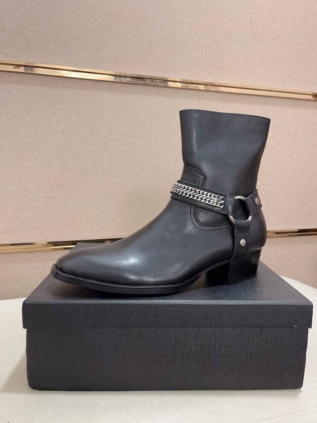 Saint Laurent Cowhide Pointed-Toe Ankle Boots in Black · view 1