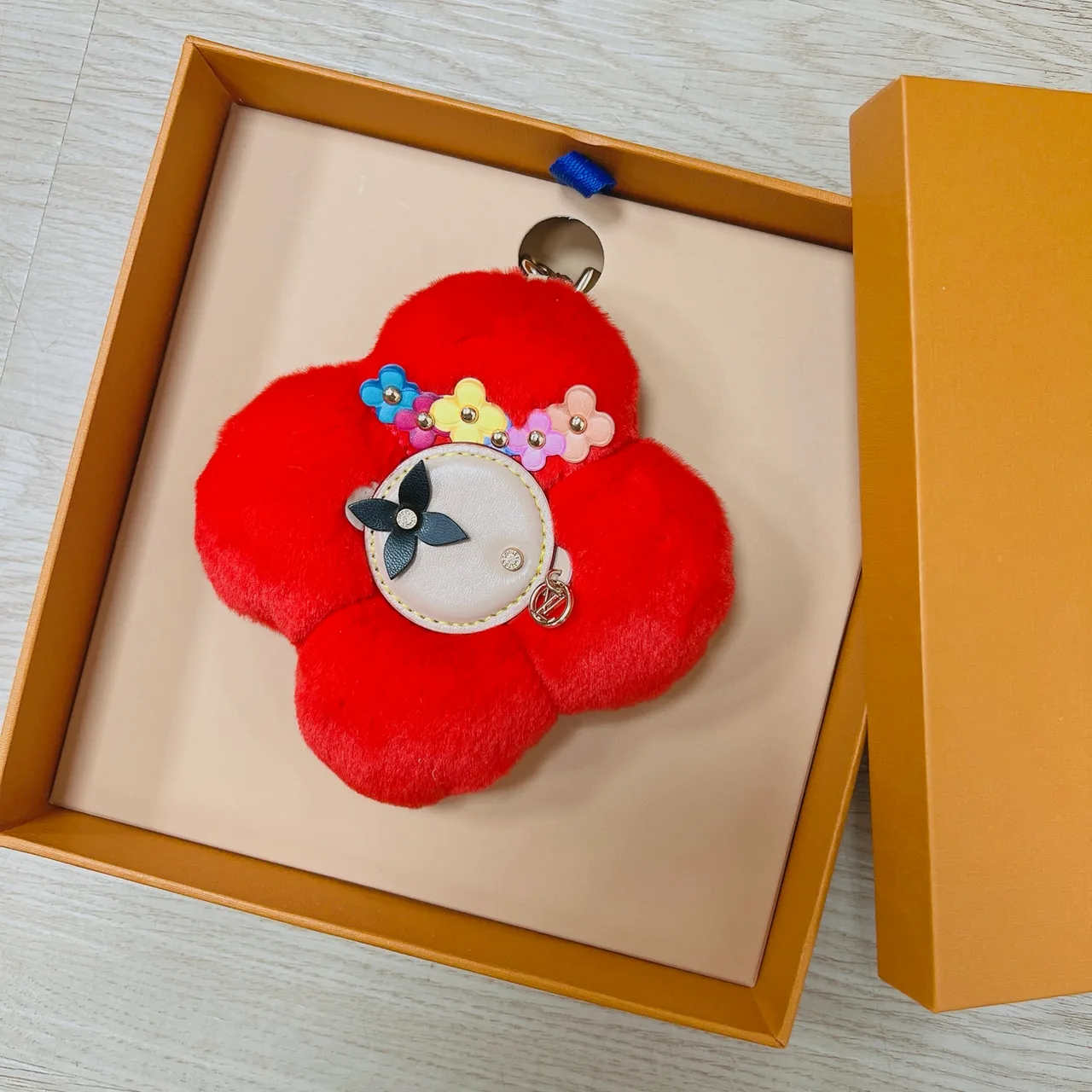 Louis Vuitton Faux-fur flower bag charm in Purple & White & Brown & Yellow & Red & Pink & Black & Blue & Cream · view 5