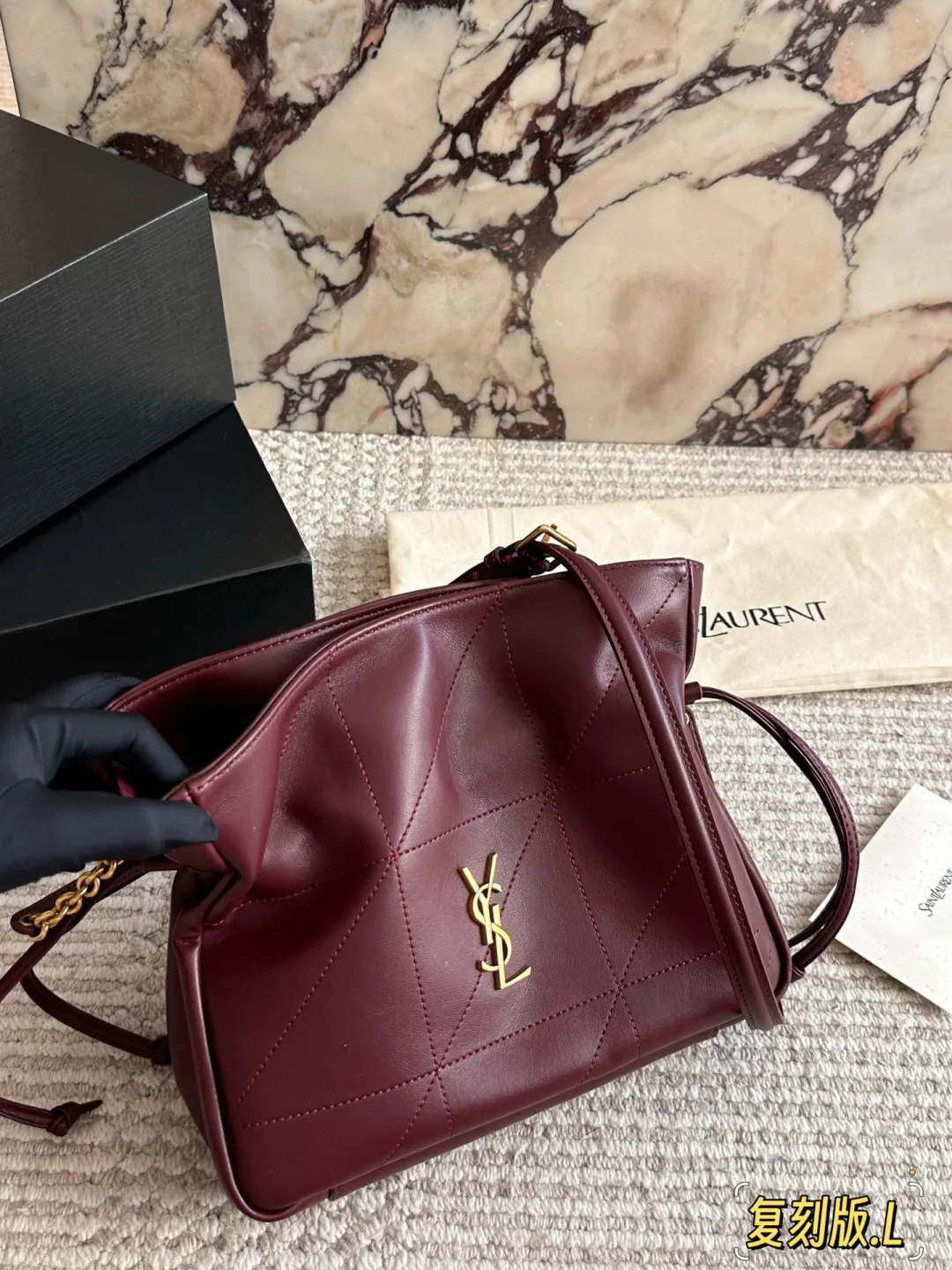 Saint Laurent Bucket Bag in Black / Burgundy / White / Brown · view 2