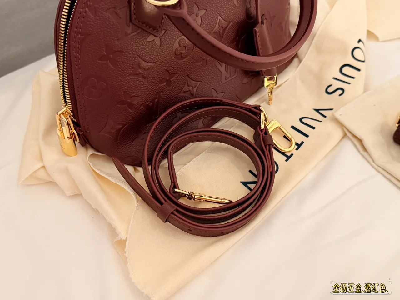 Louis Vuitton Quilted Handbag in Burgundy · view 6