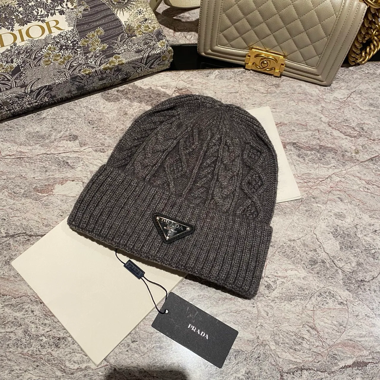 Prada Cable-Knit Beanie in Grey / Black / White / Tan / Cream · view 1