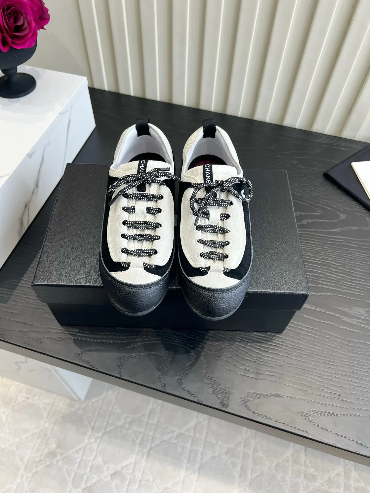 Chanel Cowhide Smooth Sneakers in Black · view 1