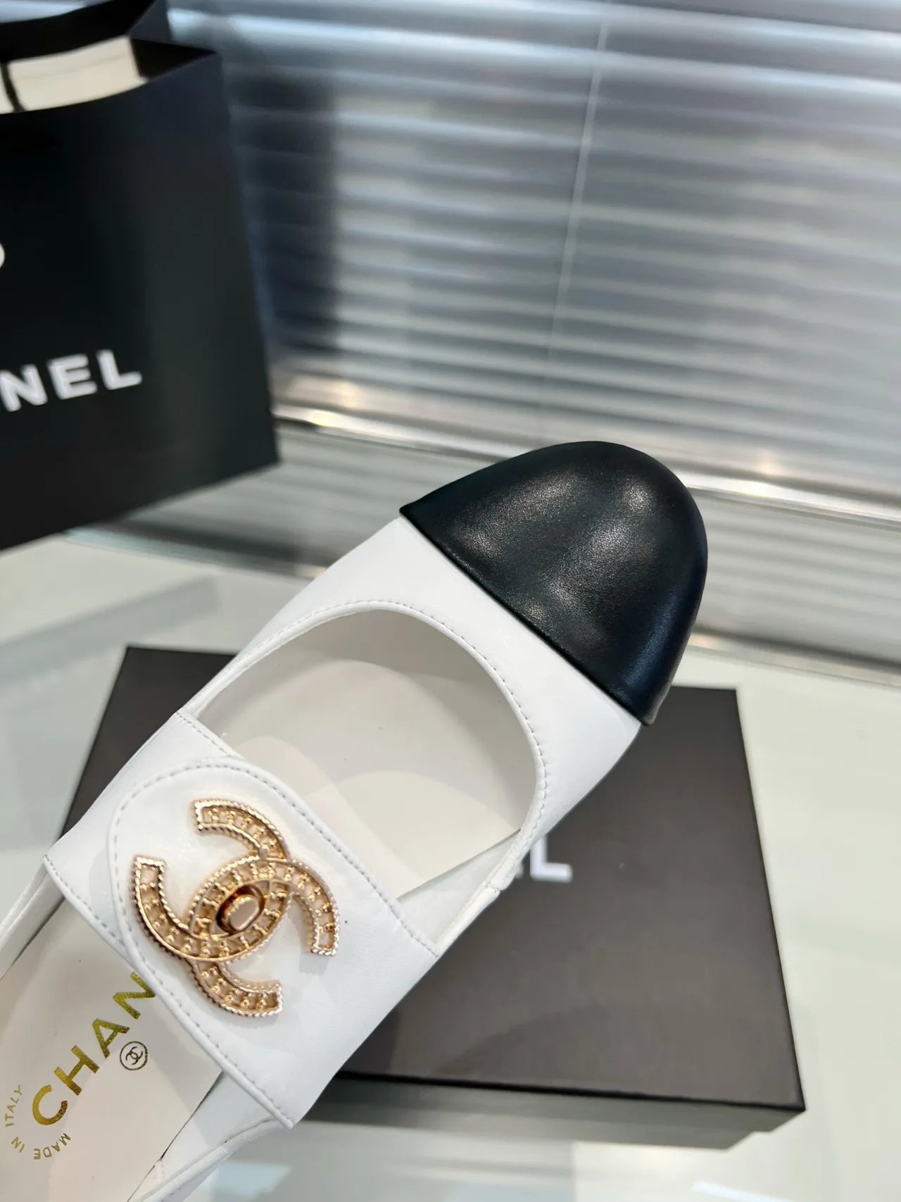 Chanel Cap-toe loafers in Black / Cream · view 8
