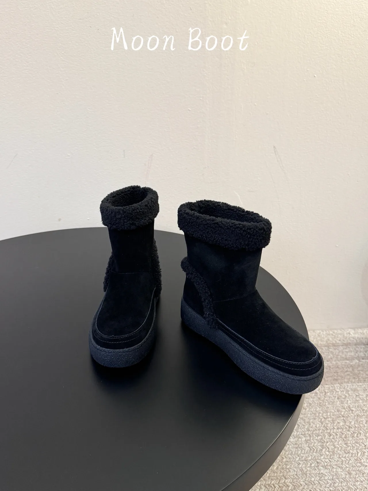 Moon Boot Cowhide Ankle Boots in Black · view 3