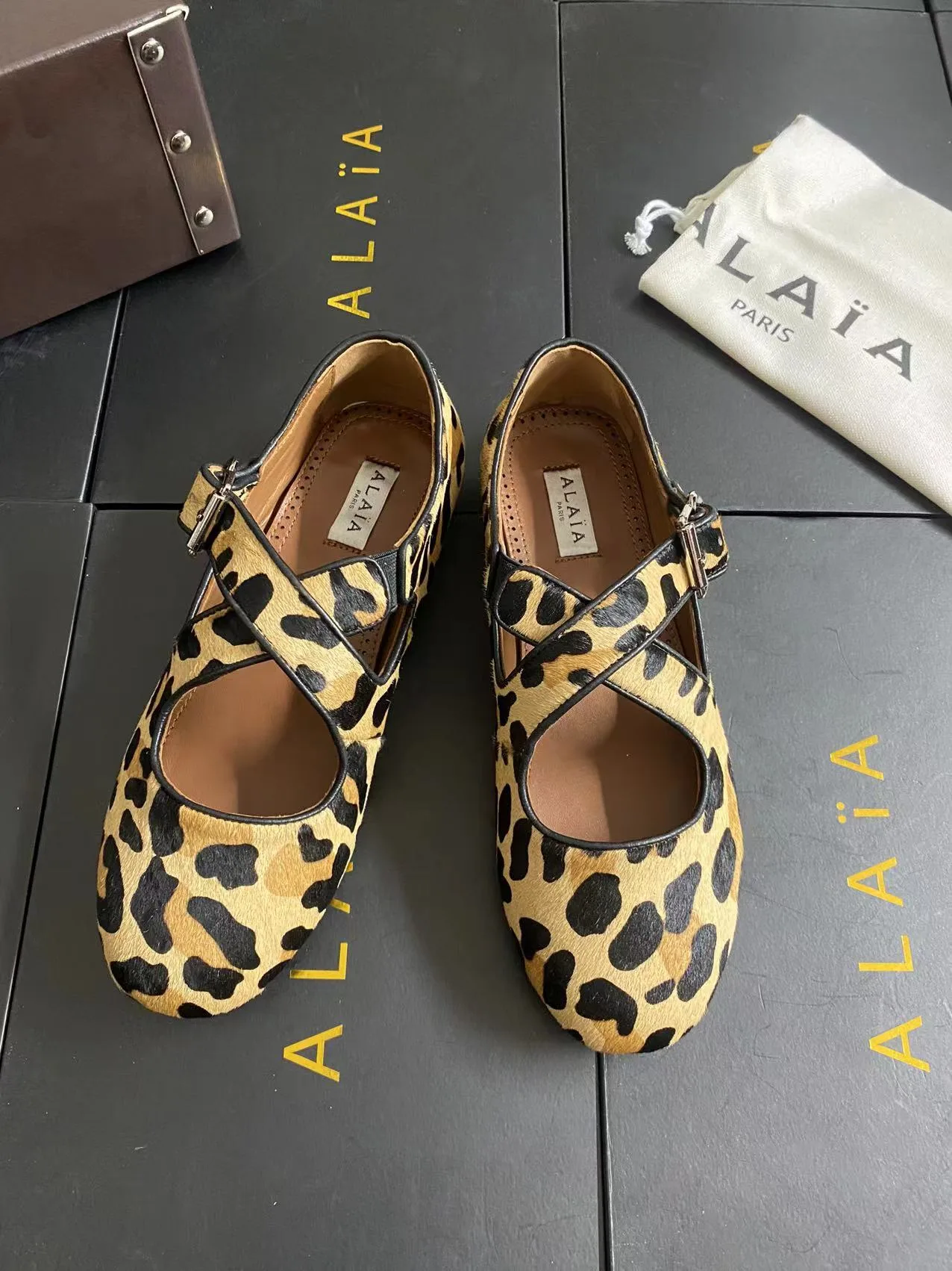 Alaia Cowhide Sheepskin Round-Toe Buckle Ballet Flats in Brown · view 5