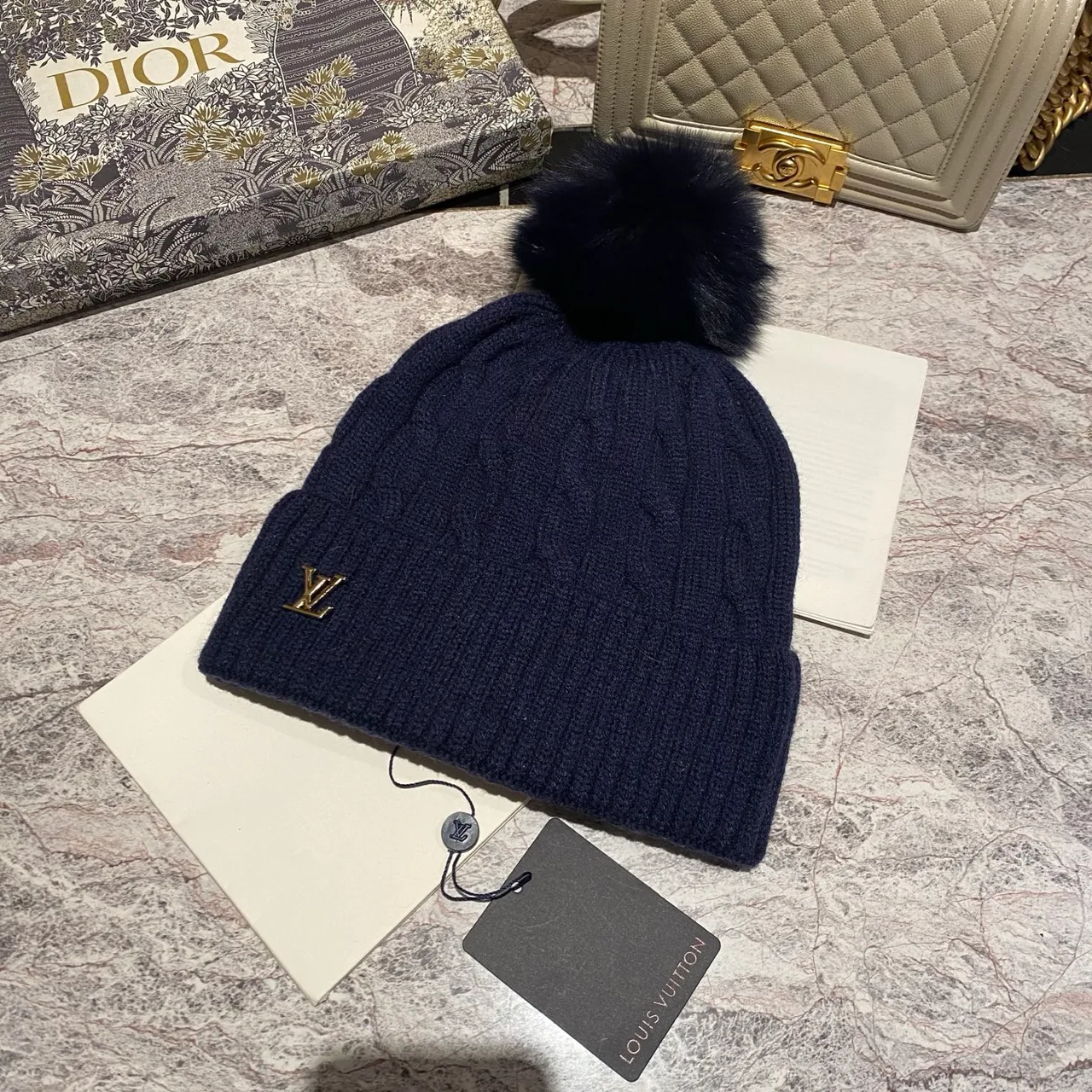 Louis Vuitton Cable knit pom beanie in Black & White & Blue & Burgundy & Cream & Grey & Brown & Pink · view 3