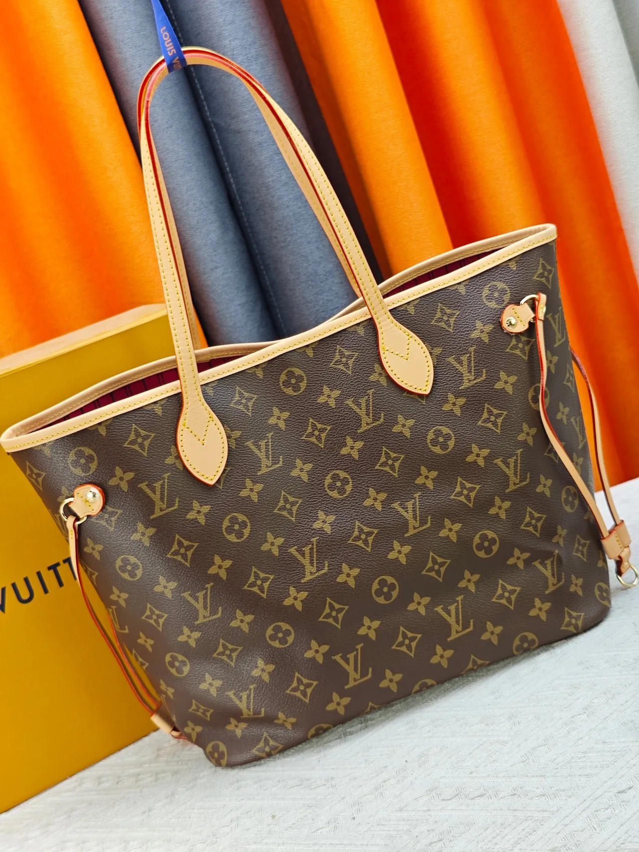 Louis Vuitton Neverfull Clutch in Brown · view 3
