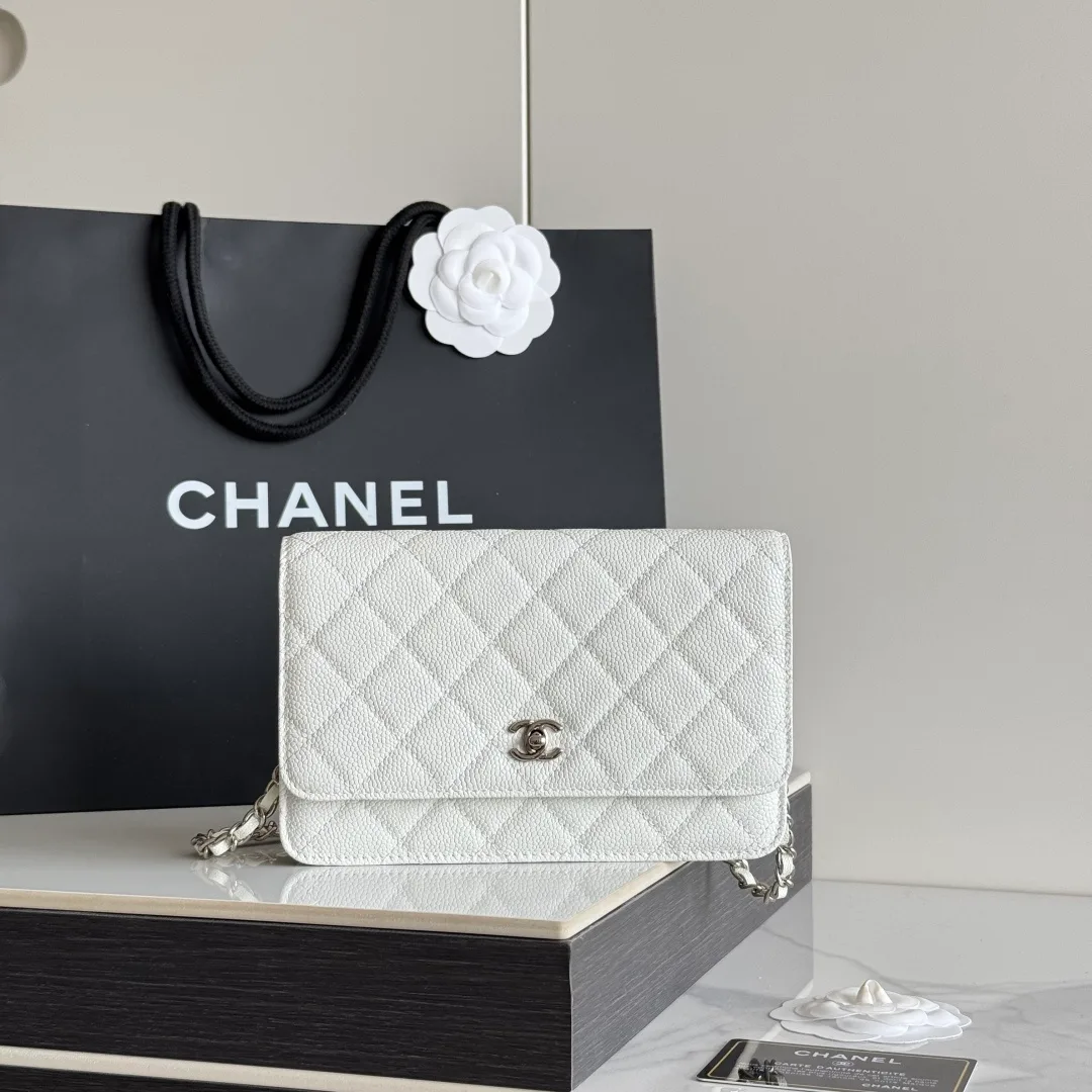Chanel Calfskin Quilted Clutch in White · view 1