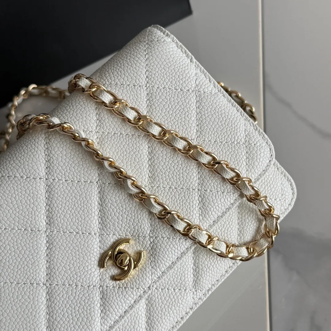 Chanel Calfskin Quilted Clutch in White · view 7