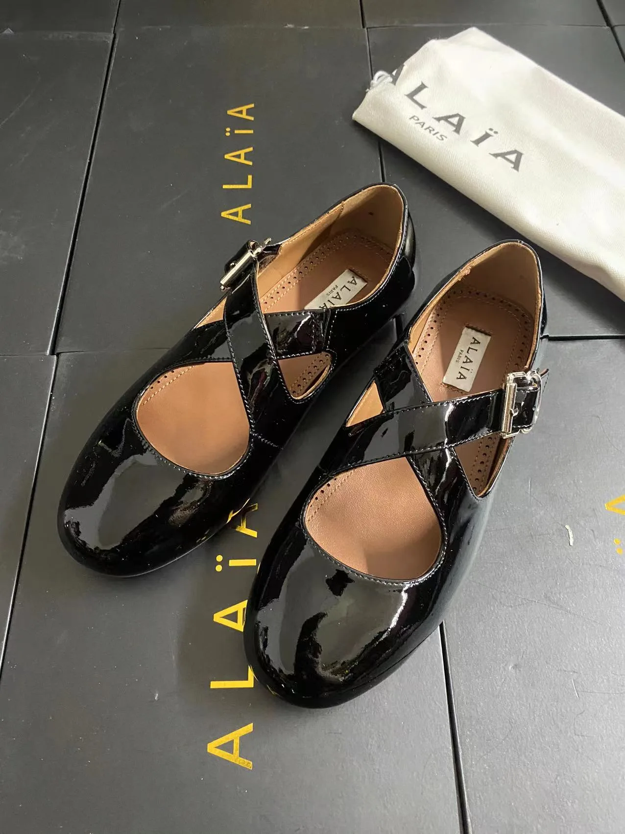 Alaia Cowhide Sheepskin Glossy Square-Toe Mary Jane Flats in Black · view 3