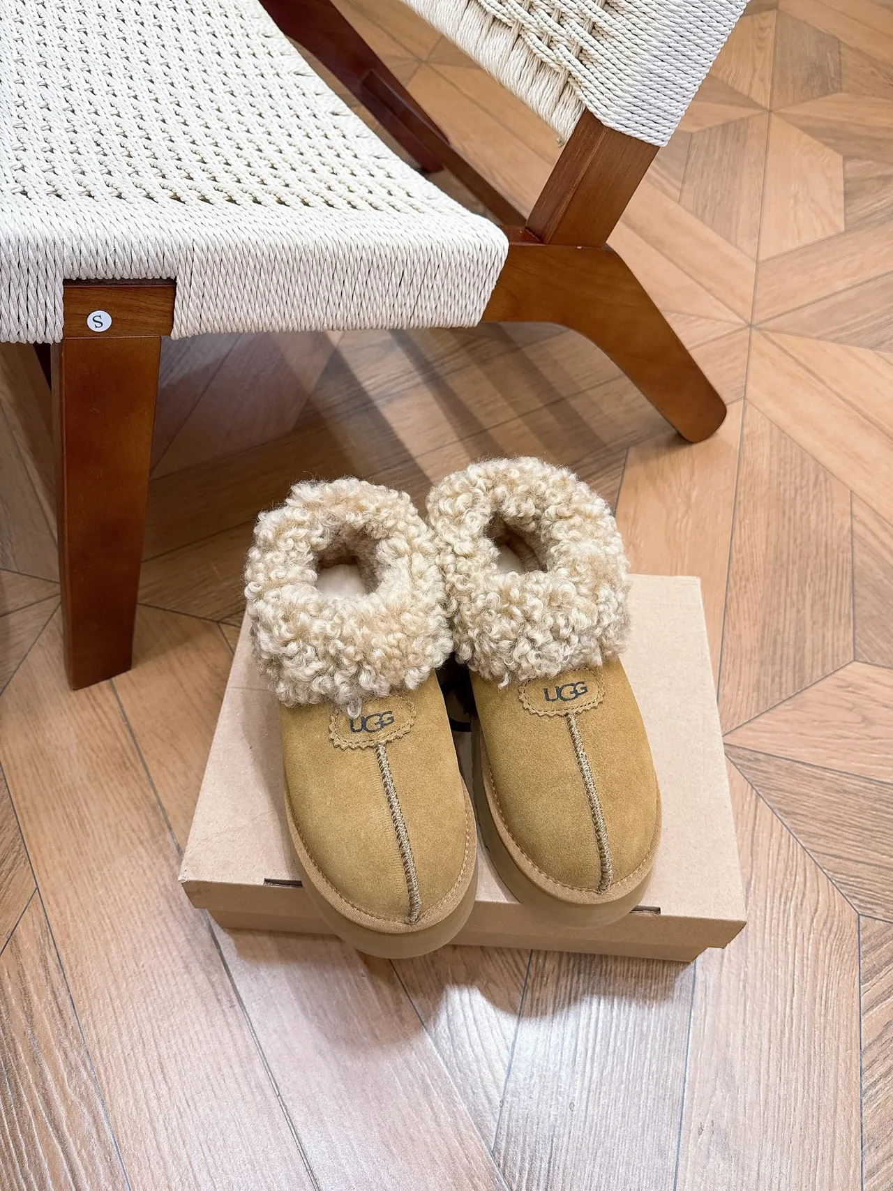 UGG Cowhide Wool Round-Toe Slippers in Brown · view 1