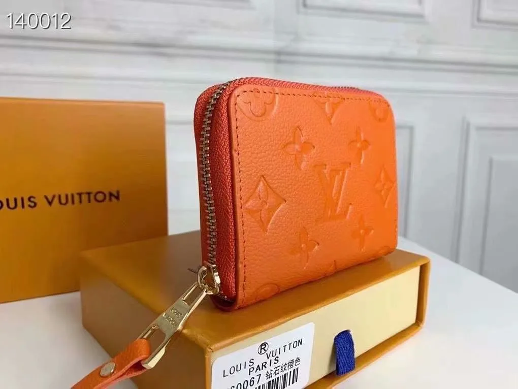 Louis Vuitton Zip Coin Wallet in Orange · view 2