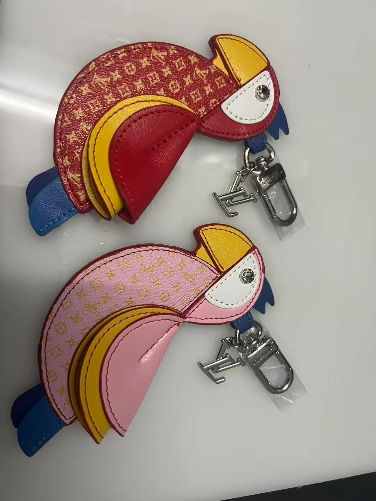 Louis Vuitton Parrot Keychain in Red & Pink · view 1