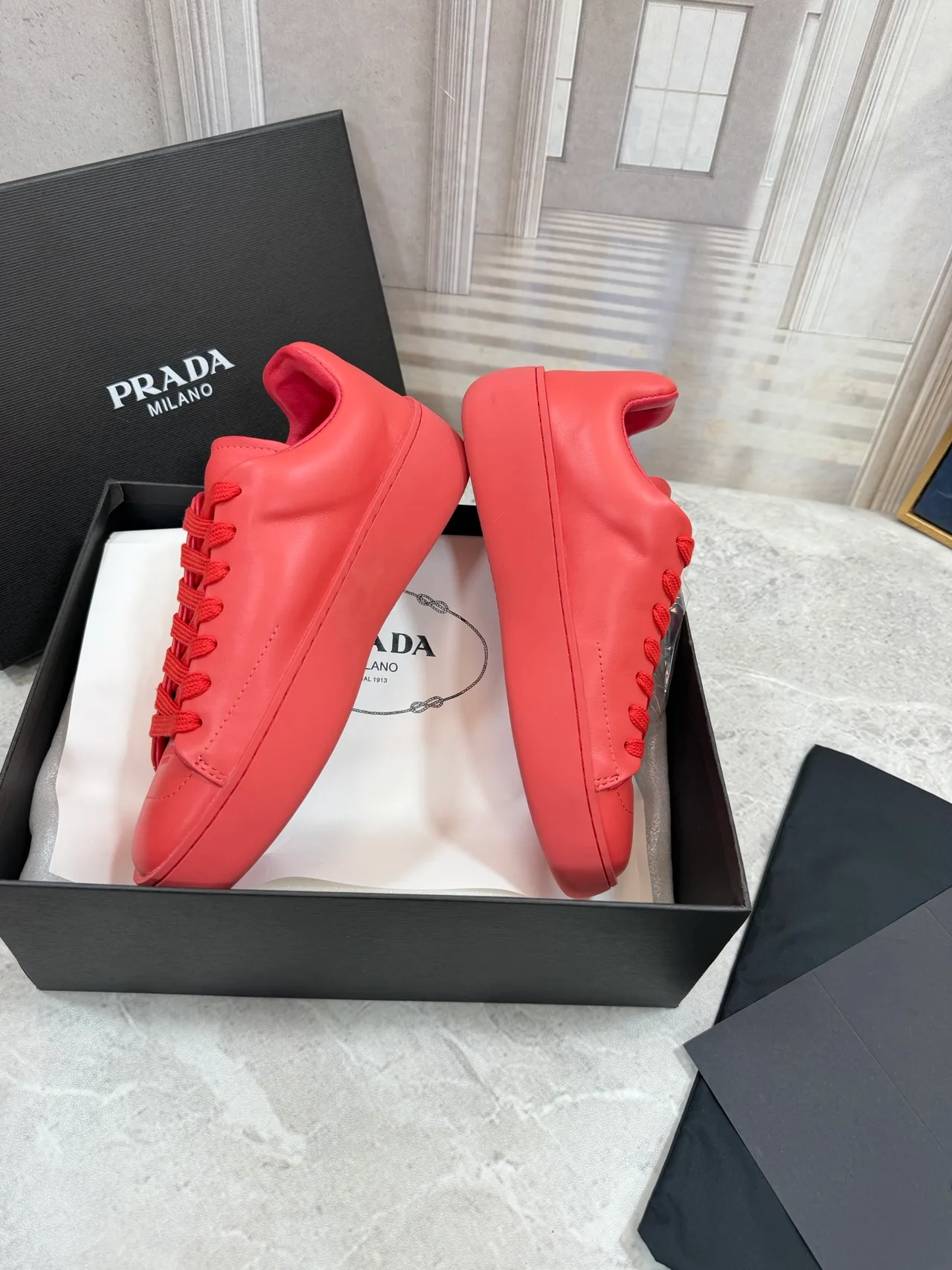 Prada Cowhide Round-Toe Low-Top Sneakers in Red · view 3