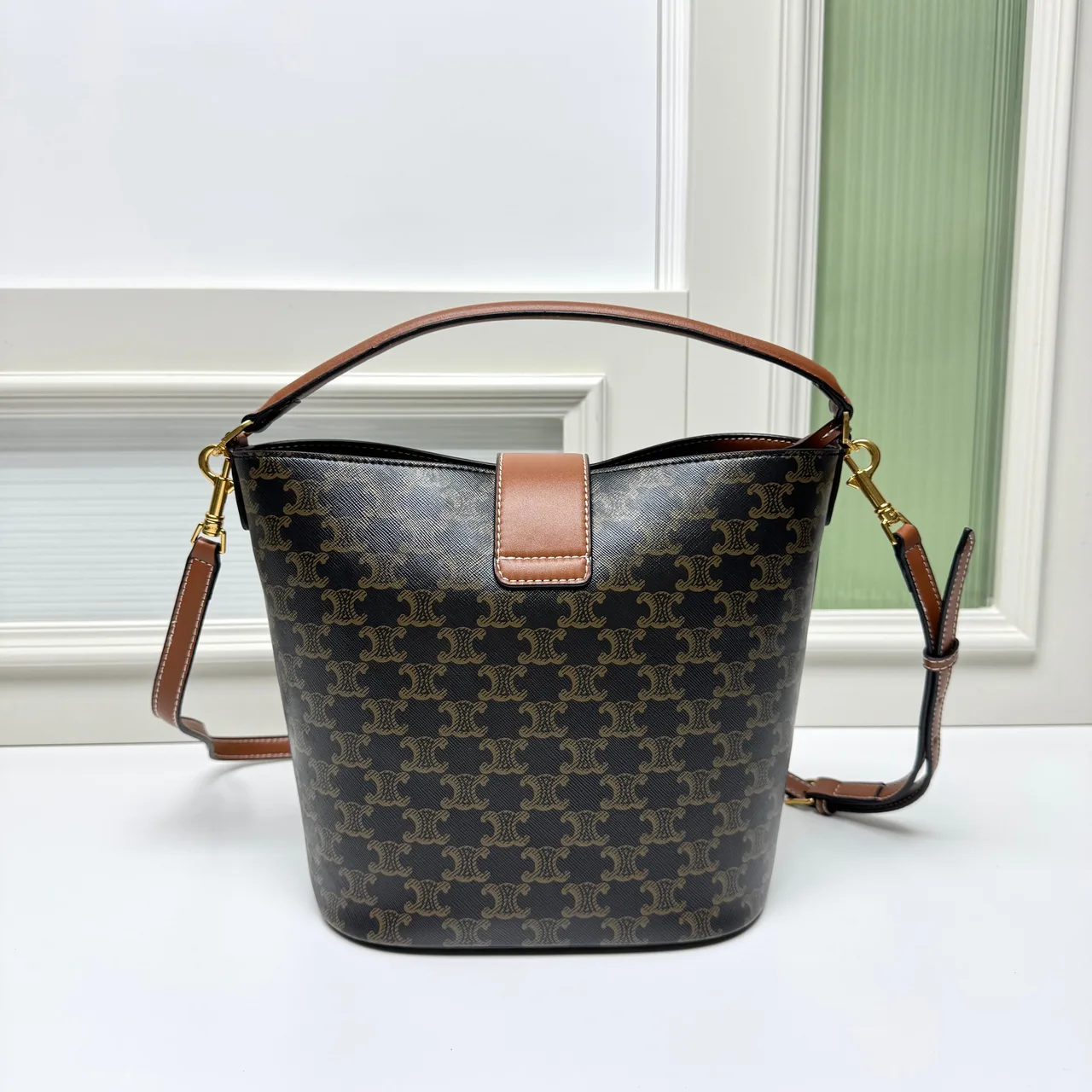 Celine Calfskin Quilted Monogram Bucket Bag in Brown · view 3